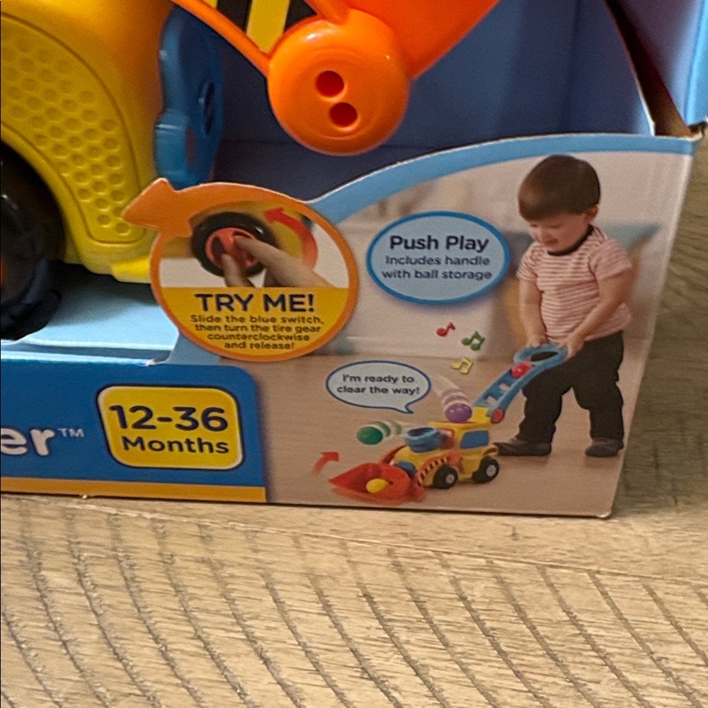 VTech Pop-a-Balls Push & Pop Bulldozer - Yellow and Orange - Picture 3 of 4